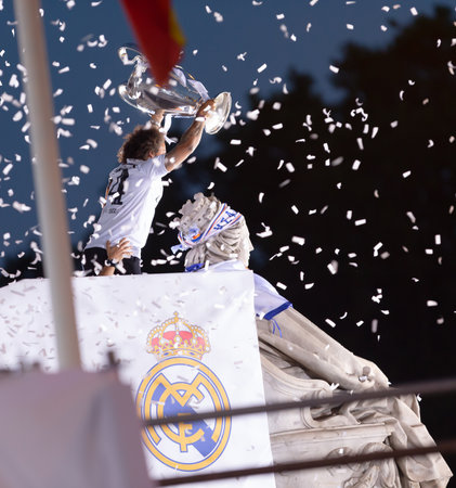 Madrid, Spain- May 29, 2022: Real Madrid CF celebrates its 14th European Championship in Madrid. The team captain, Marcelo presents the European Cup to the Goddess Cibeles.のeditorial素材