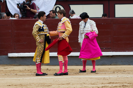 Madrid, Spain- June 2, 2022: Rafael Gonzalez suffers a catch during his alternative at the Las Ventas bullring in Madrid. bullfights Bullfighter with a crutch.のeditorial素材