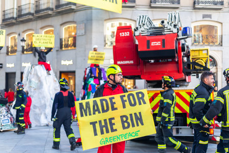 Madrid, Spain- November 25, 2022: Greenpeace demonstrates in Plaza de Callao in Madrid against Black...