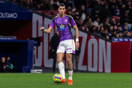 Madrid, Spain- January 21, 2023: Soccer match between Atletico de Madrid and Real Valladolid at Civitas Metropolitano. Jawad El Yamiq fights for the ball on the pitch.のeditorial素材
