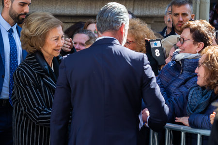 Madrid, Spain- March 3, 2023: Queen Emeritus SofÃ­a visits the church of Cristo de Medinacelli in Madrid. The queen greets the people waiting for her arrival at the church.のeditorial素材