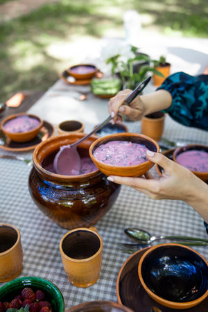 Cold summer soup of beets, kefir, cucumbers, eggs and dill. Summer food, Eastern European cuisine.の写真素材