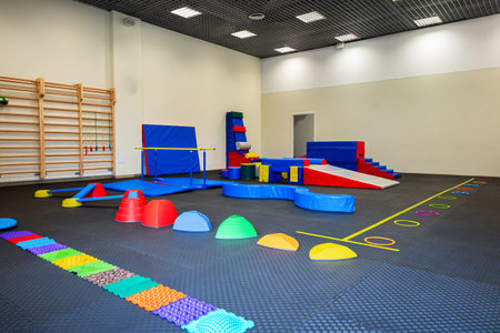 Colorful Gymnastic Equipment in Modern Training Room Kid's Physical Development Zoneの写真素材