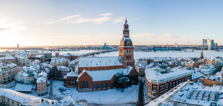 Aerial panorama view of Riga old town during beautiful winter day in Latvia. Freezing temperature in...
