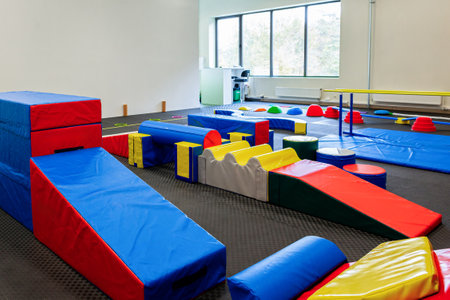 Colorful Gymnastic Equipment in Modern Training Room Kid's Physical Development Zoneの写真素材