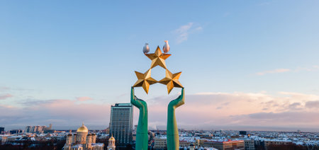 Freedom Monument known as Milda, located in the centre of Riga, the capital of Latvia. Close-up aerial view of three starsの写真素材