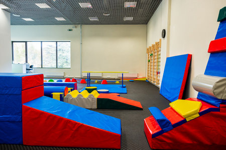 Colorful Gymnastic Equipment in Modern Training Room Kid's Physical Development Zoneの写真素材