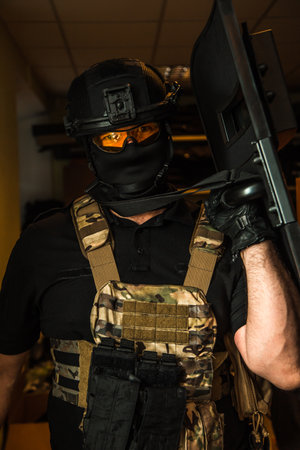 Elite tactical unit ready for operation, fully equipped special forces officers with modern gear...