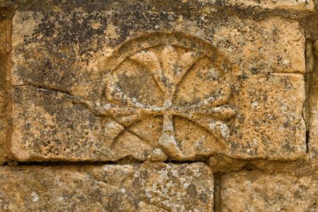 Cross carved in stone. Sarlat cathedral, Dordogne, Franceの写真素材