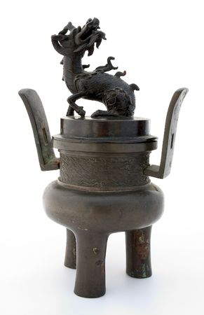 Ancient bronze incense burner, isolatedの写真素材