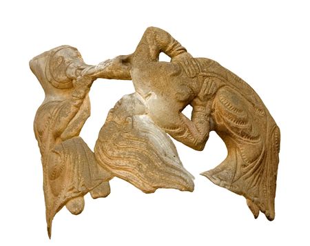 Detail from a capital in Santiago's church portal in Aguero, Huesca, Spain. Salome dancing and a musician playing an instrument.の写真素材