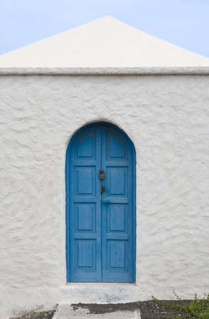 Blue door in a house in El Golfo, Lanzarote, Canary Islands, Spainの写真素材