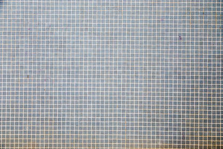 Aged tile wall background