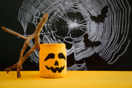 Halloween symbol against background of cobwebs and bats. Concept of halloween .の写真素材