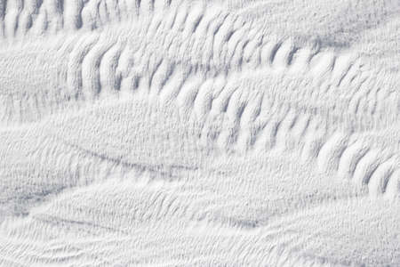 Gray - white texture of Pamukkale calcium travertine in Turkey, abstract pattern, close-up.の写真素材