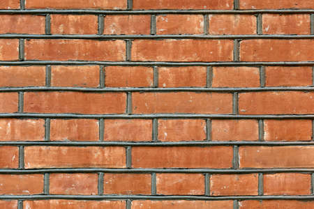 Old red brick wall vintage texture background.の写真素材