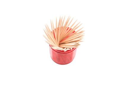Toothpicks in a transparent red caseの写真素材