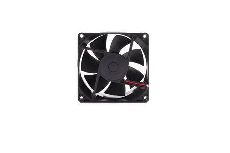 Black fan with wires on white backgroundの写真素材