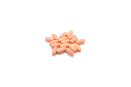 Orange tablets on white backgroundの写真素材