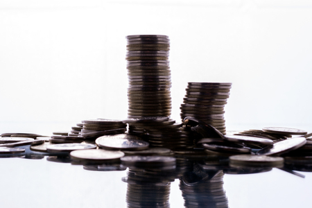 Pile of coins on white background