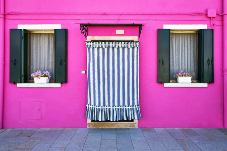 Front of the pink house on the island of Burano, Venice, Italyの写真素材