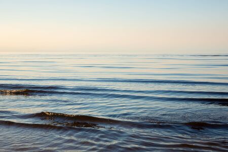 Afterglow. Evening calm on the Sea of Azov. Bright afterglow.の写真素材