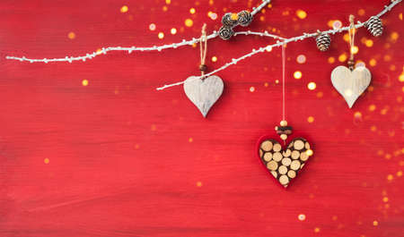 Red Christmas background with hearts.