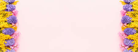 Mimosa and hyacinth flowers banner on a pink background. Mothers Day, Valentines Day, Birthday...