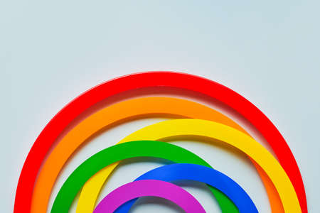 Abstract rainbow on a light blue background. Top view, copy space. LGBT concept.の写真素材