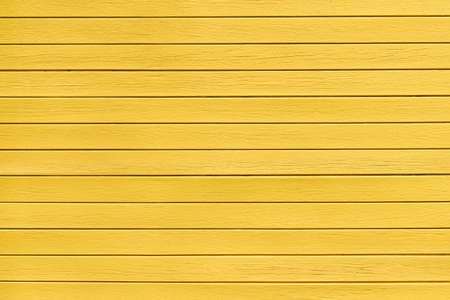 Yellow wooden background. Abstract background. Top view, copy spaceの写真素材