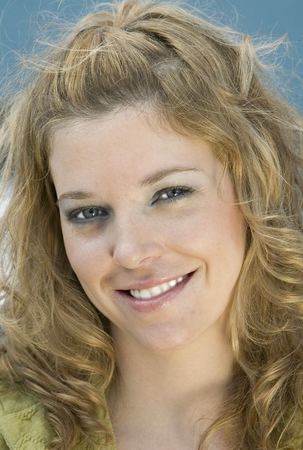 Beautiful smiling young woman posing for the camerasの写真素材