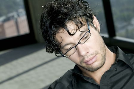 Funny looking man with glassesの写真素材