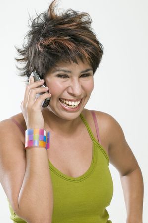 Smiling woman talking on her cell phoneの写真素材