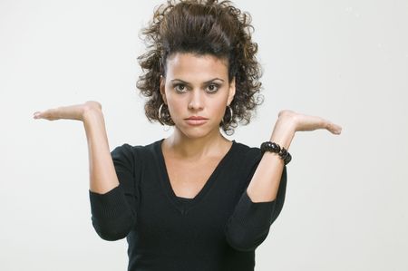 Young woman doing gestures with her handsの写真素材