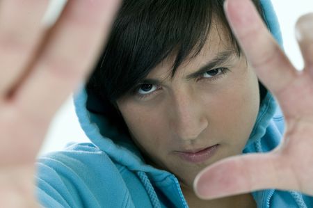 young men messuring with handsの写真素材