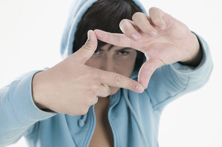 young men messuring with handsの写真素材