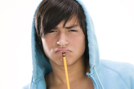 young men thinking with pencilの写真素材