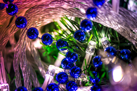 Abstract, blurry, vibrant and colorful background. A shot of blue Christmas decorations and lights...