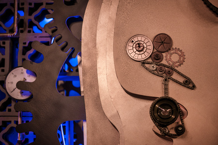 Abstract, colorful and blurry shot of steam punk gears and mechanisms. Rotating home decor and...