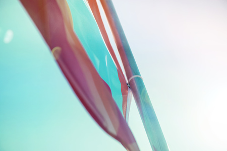 Colorful festival flags on clear blue sky summer backgroundの写真素材