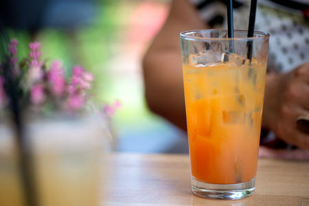 Glass of alcoholic tequila sunrise