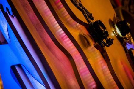 Abstract, colorful and blurry shot of steam punk gears and mechanisms. Rotating home decor and...