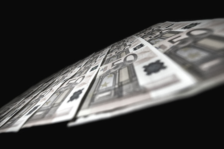 50 euro paper money on black background. Hundreds of banknotes. Concept of cash flow, finances, rich people, millionaire and successful business.の写真素材