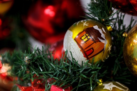 Christmas toy on Christmas tree whit pictures hoseの写真素材