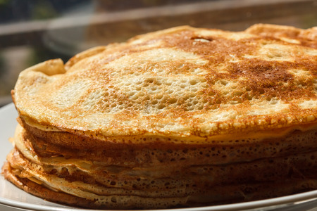 the Golden pancakes with butterの写真素材