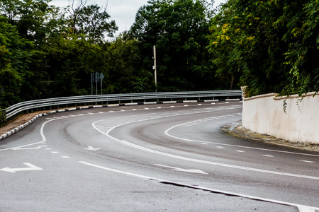 twist road in the forestの写真素材