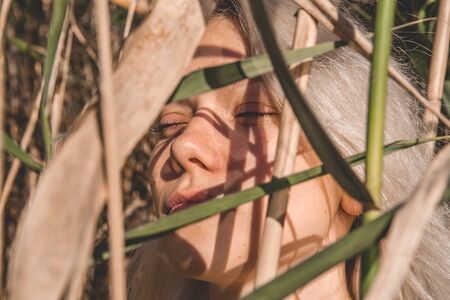 Portrait of a girl in high grass