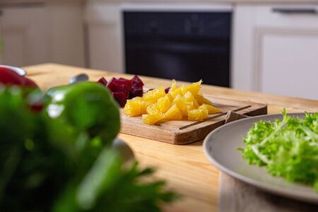 Fresh farmers tomatoes and basil on wood table.