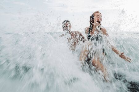 Honeymoon in the tropics of a husband and wife. Romance in hot countries. Wallow in the sand and be happy and in love. Loverの写真素材