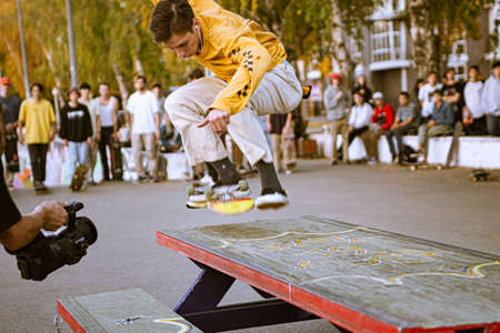 A skateboarder in action at Venice Beach Skate Park in Los Angeles, California, USAのeditorial素材